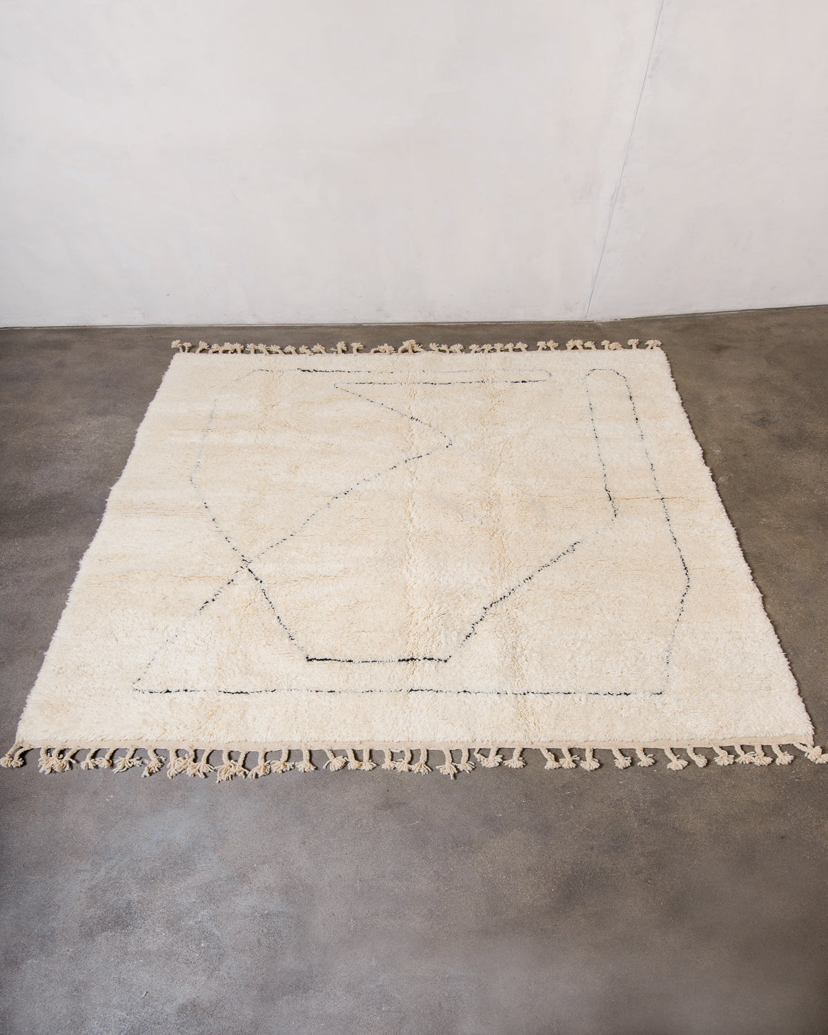 Modern, designer, handcrafted Berber rug from Morocco. Beniourain carpet with minimalist design, natural wool pile and a fluffy texture.